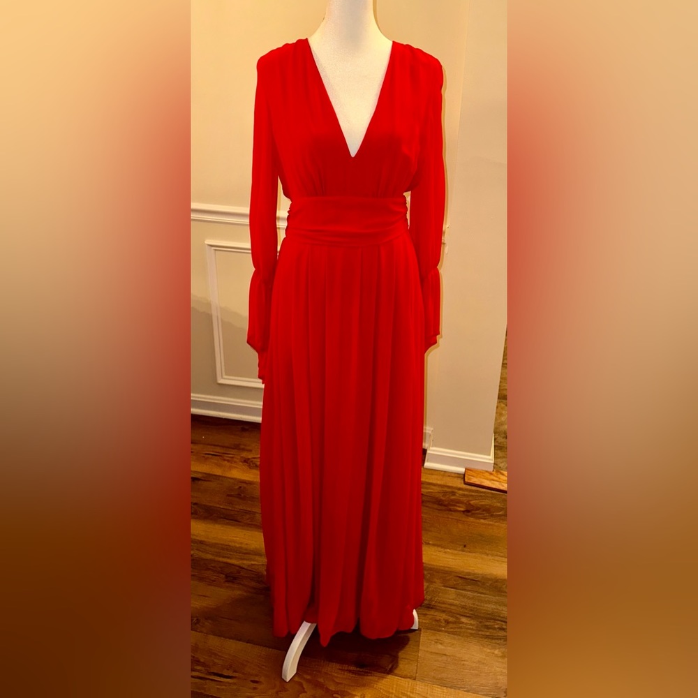Beautiful red chiffon dress. Open back and sexy v neckline.Goddess like.